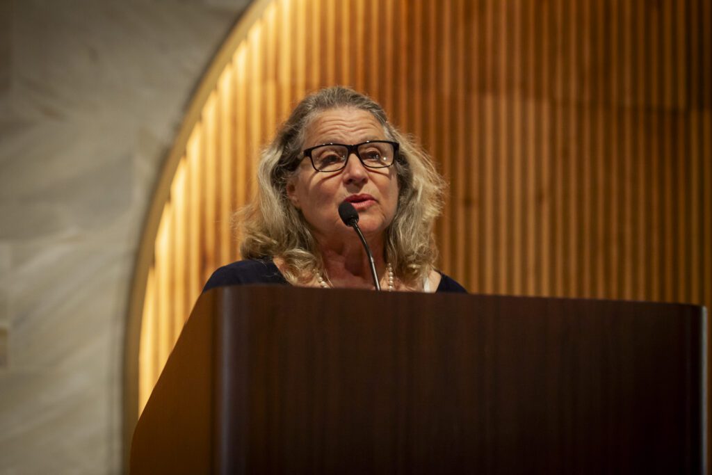 Woman speaking at podium